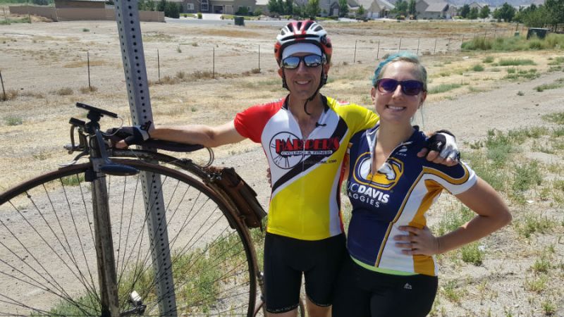 Randy and Amy Oleynik take a break while riding their penny farthings across the United States
