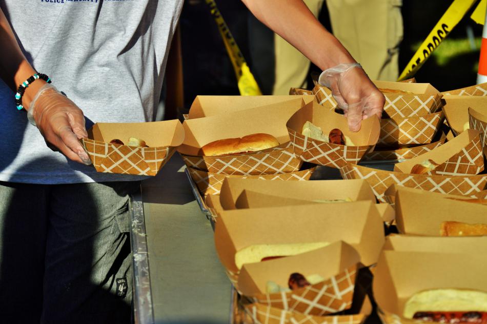 Hot dogs handed out to hungry visitors.