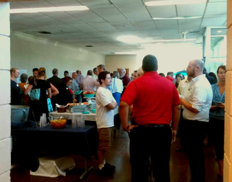 Visitors gather into the new Studio expansion.