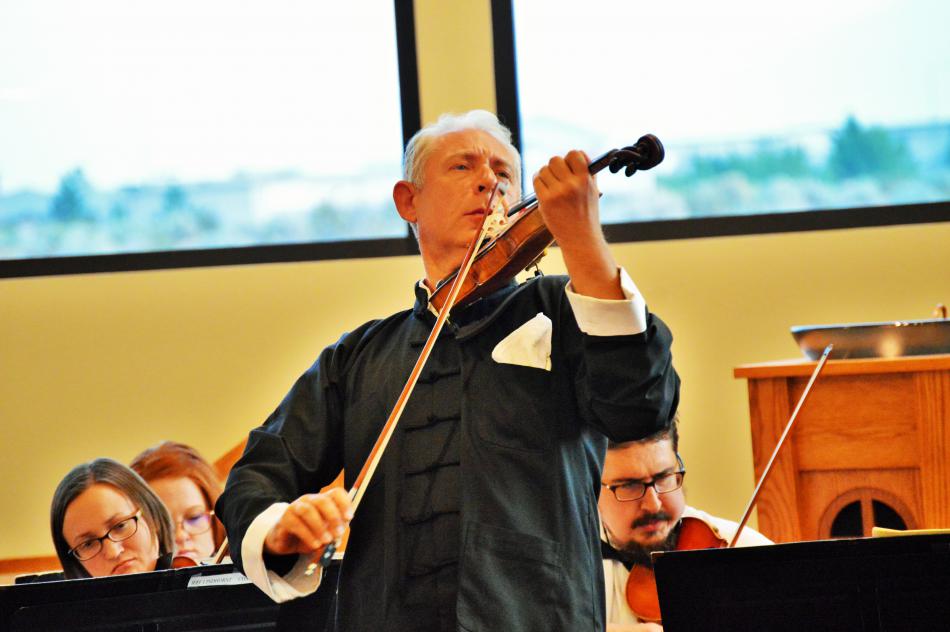 Photos by Brett Fisher. Violin soloist Alex Eisenberg performs with the Tahoe Symphony Orchestra Tuesday night.