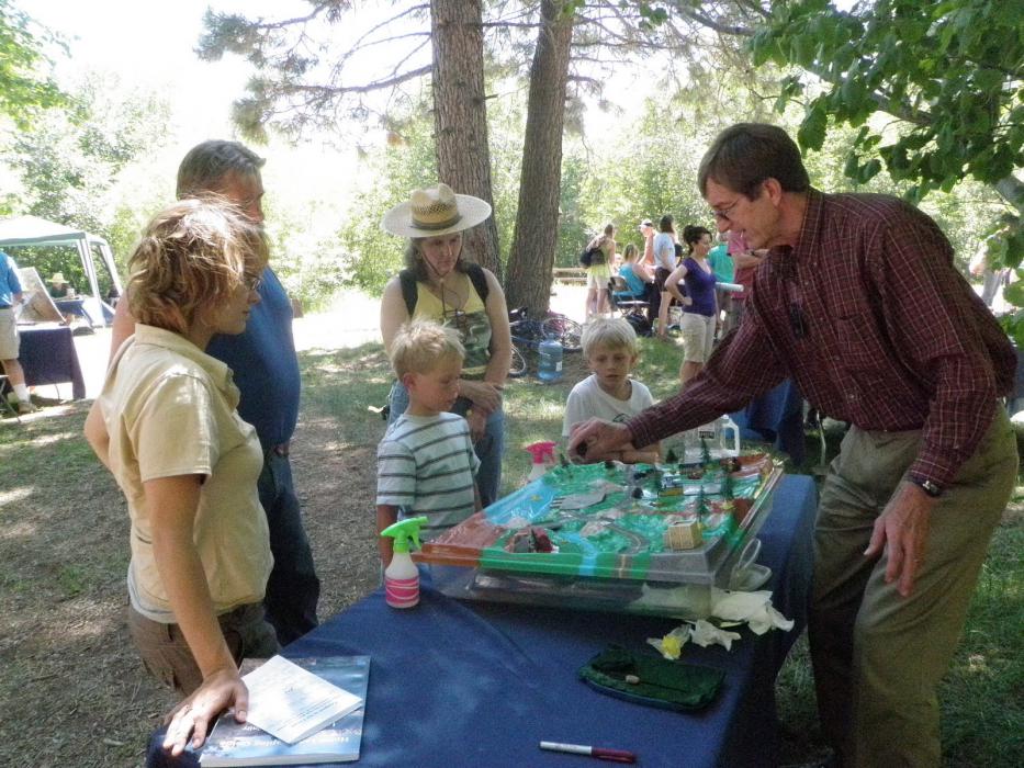Water Resource Specialist John Cobourn shows how watersheds works during a Lake Tahoe Children’s Environmental Science Day.
