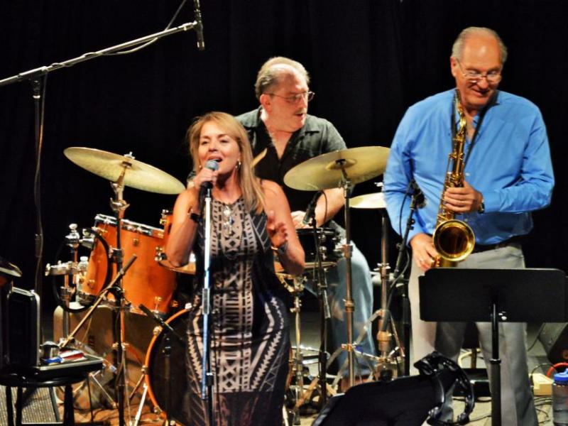 Photos by Brett Fisher. Carolyn Dolan and members of her band.