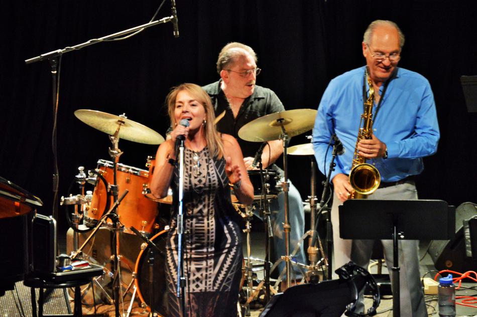 Photos by Brett Fisher. Carolyn Dolan and members of her band.