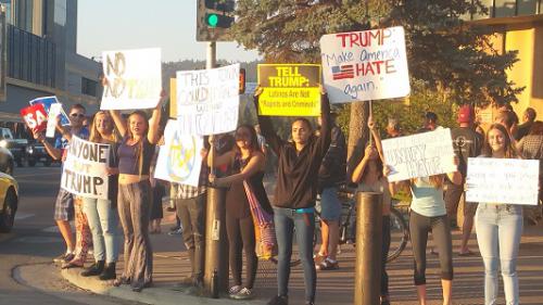 Protesters outside the Trump dinner. Photo by STN.