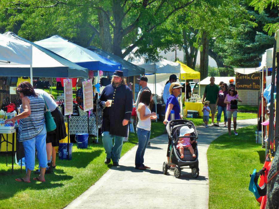 A Union soldier walks along vendor row Saturday at Mills Park.