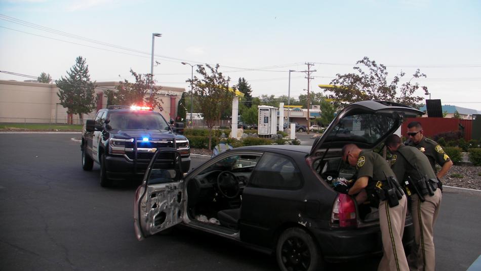 Carson City Sheriff's officers at the car recovered Monday after a citizen saw it reported stolen on Facebook.
