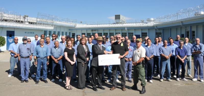 A $4,500 check was presented Wednesday to Western Nevada College for the inmate scholarship program.