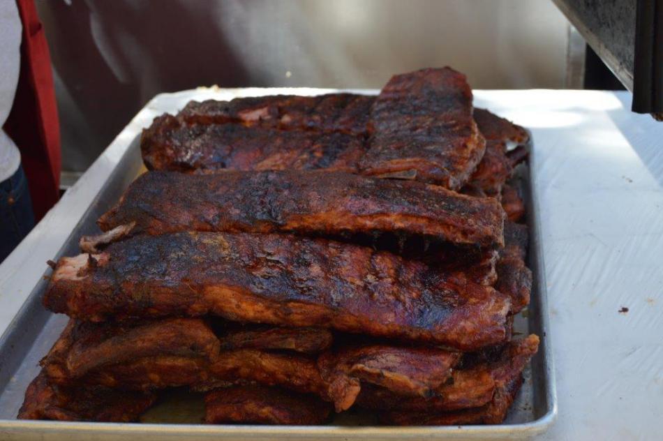 A pan loaded with St. Louis style ribs fresh out of the cooker.