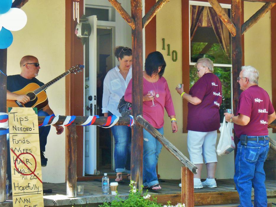Wine Walk guests enter through the front of the building at 110 S. Curry Street.