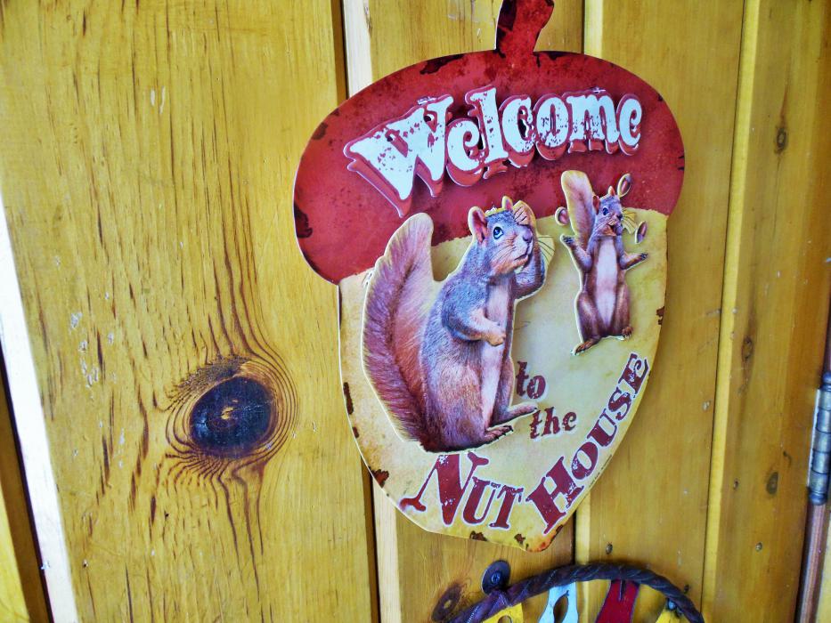 Welcome sign on the front door to Touched By Angels.