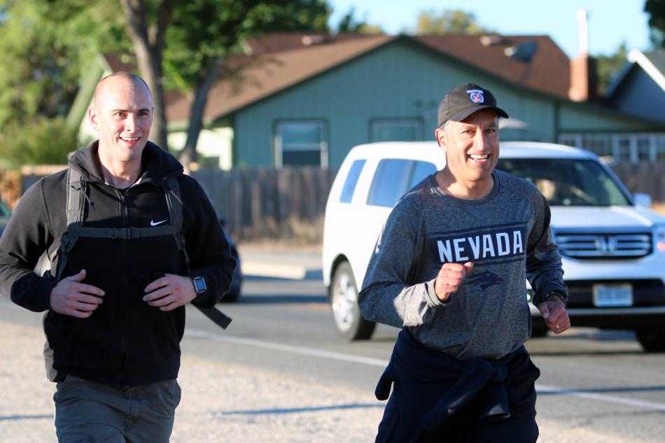 Gov. Brian Sandoval, left, in Tuesday's run in Carson City.