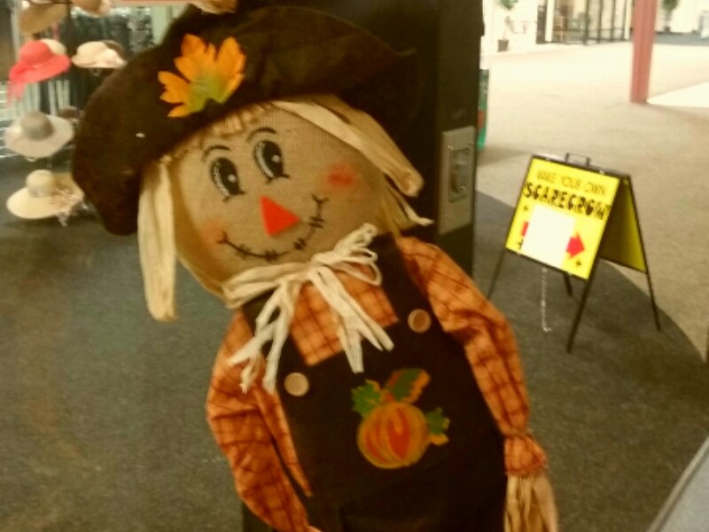 Photos by Brett Fisher. A scarecrow displayed inside Bridger Mountain Boutique.