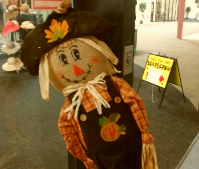 Photos by Brett Fisher. A scarecrow displayed inside Bridger Mountain Boutique.