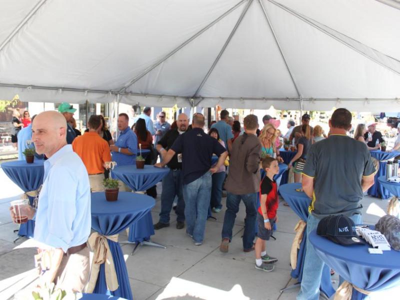 Guests mingled under a canopy at the Bob McFadden Plaza to celebrate the 50th anniversary of the Nevada Builders Alliance.