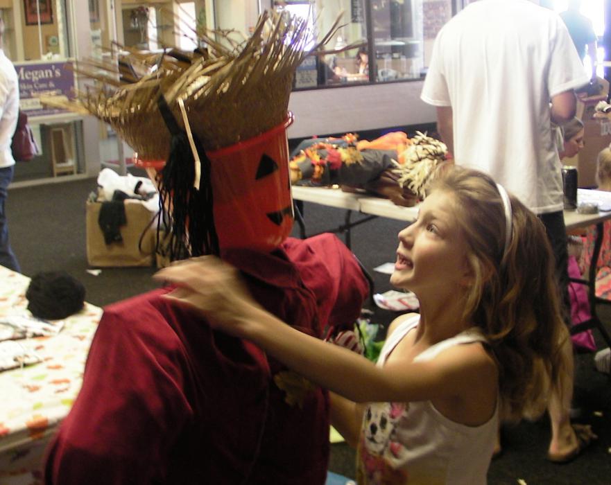 Laurel Griffith with her scarecrow 'Wilson
