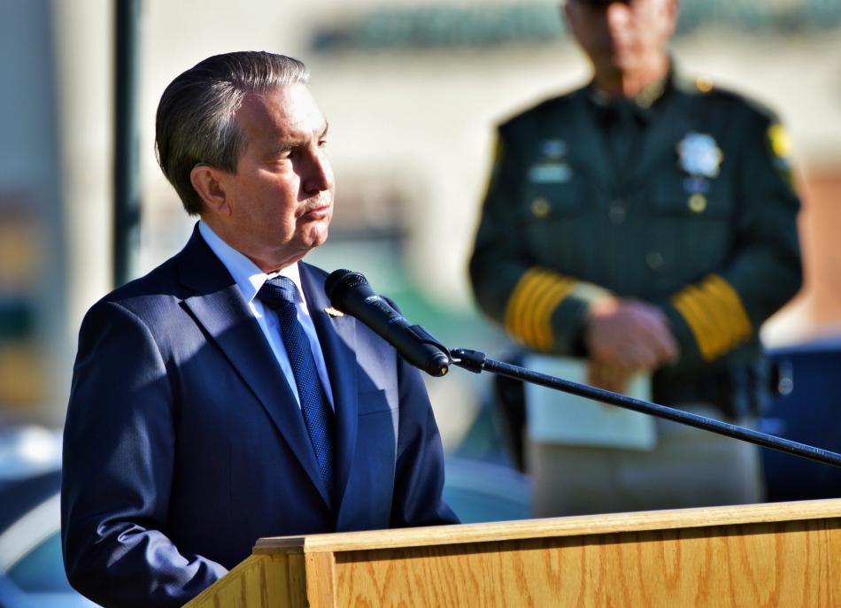 Carson City Mayor Bob Crowell delivers remarks Sunday morning at Mills Park.