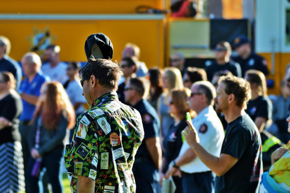 Hats are removed Sunday morning for the National Anthem.