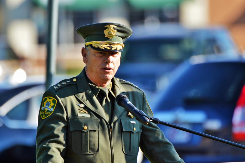Carson City Sheriff Ken Furlong addresses the crowd during the 9/11 ceremony Sunday morning.