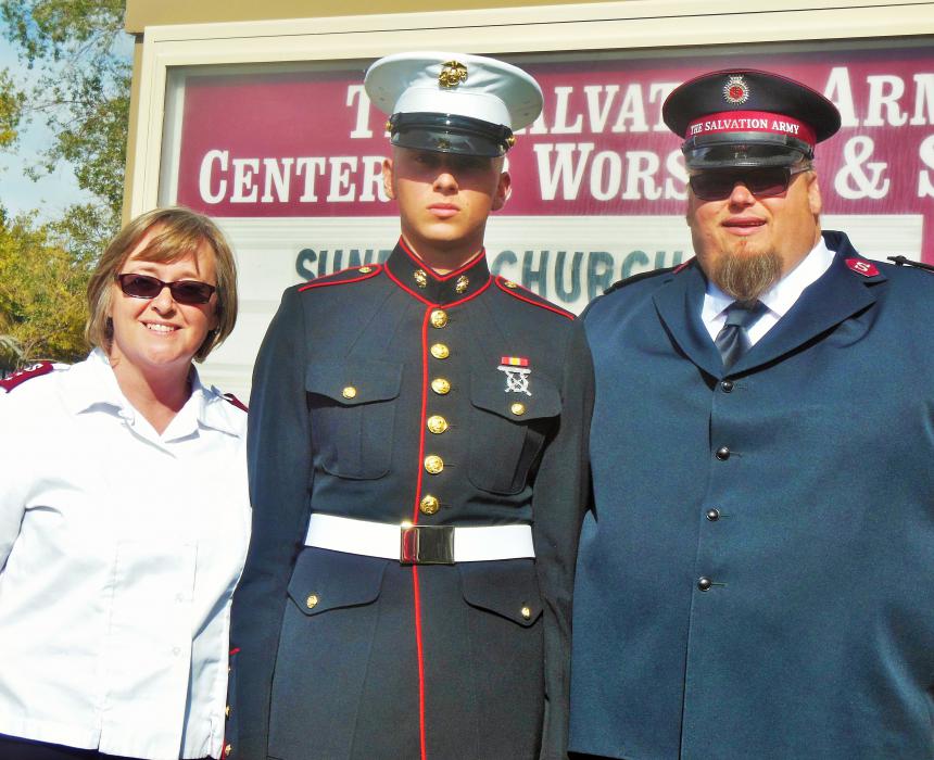 Josiah Cyr (center) with is parents, Cpts. Mark and Leslie Cyr of Carson City Salvation Army.