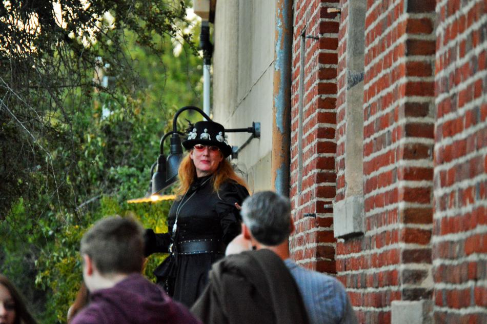 Madame Curry relays stories of underground tunnels and hauntings at the Brewery Arts Center..