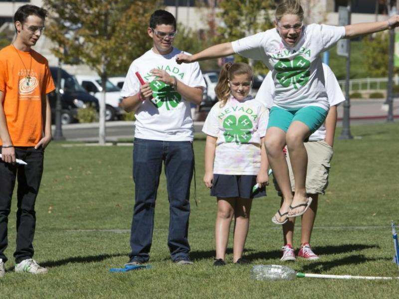 Participants of 4_H shoot off rockets they built in a past 4-H National Youth Science Day activity.