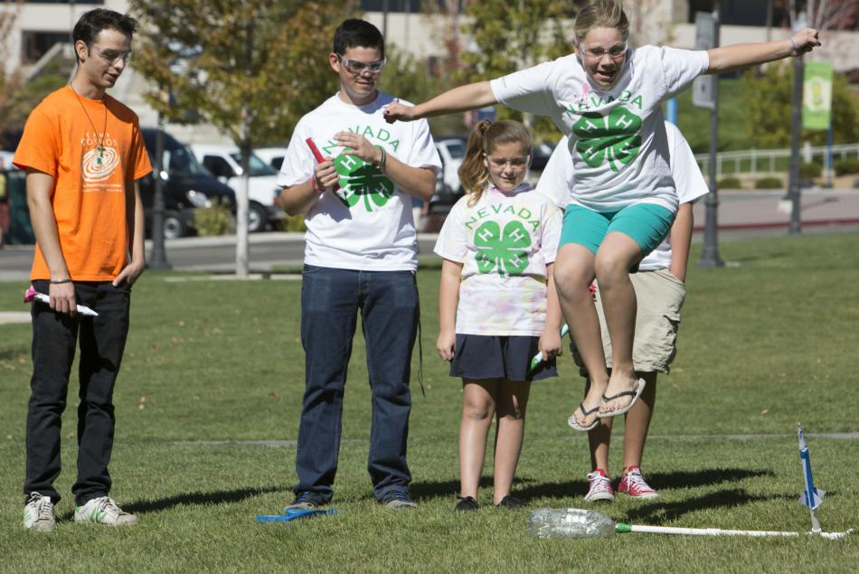 Participants of 4_H shoot off rockets they built in a past 4-H National Youth Science Day activity.