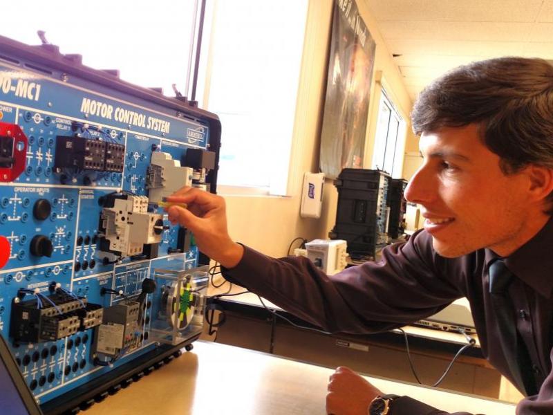 Travis McDonald works in the Manufacturing Technician Training lab at Silver Stage High School in Silver Springs.