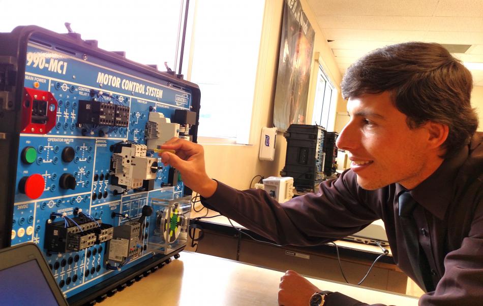 Travis McDonald works in the Manufacturing Technician Training lab at Silver Stage High School in Silver Springs.