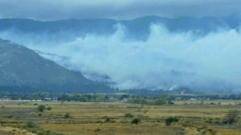 Photo by Ryan Kolda. The Little Valley Fire burning in northwestern Washoe Valley.
