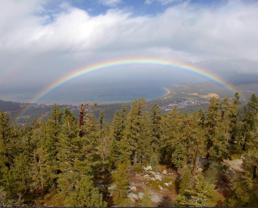 Photo courtesy Scott Garno, a rainbow over Lake Tahoe.