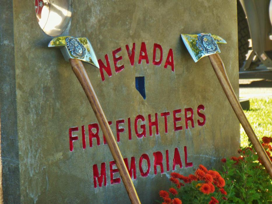 The Nevada Firefighters Memorial marker and ceremonial axes.