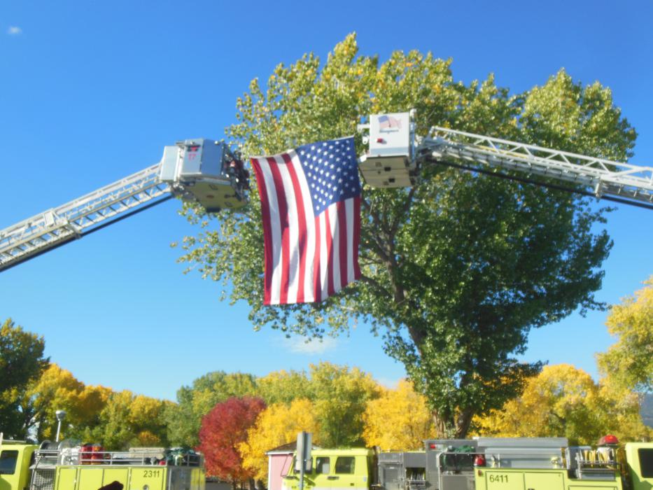 American flag facing west toward Mills Park.