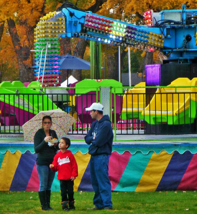 A young family at the carnival.