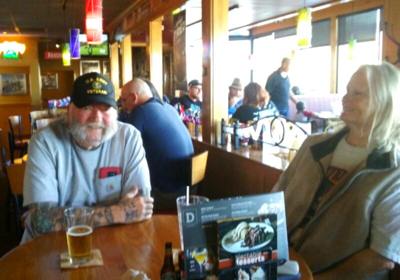 Photos by Brett Fisher. A veteran at Applebee's on S. Carson St.
