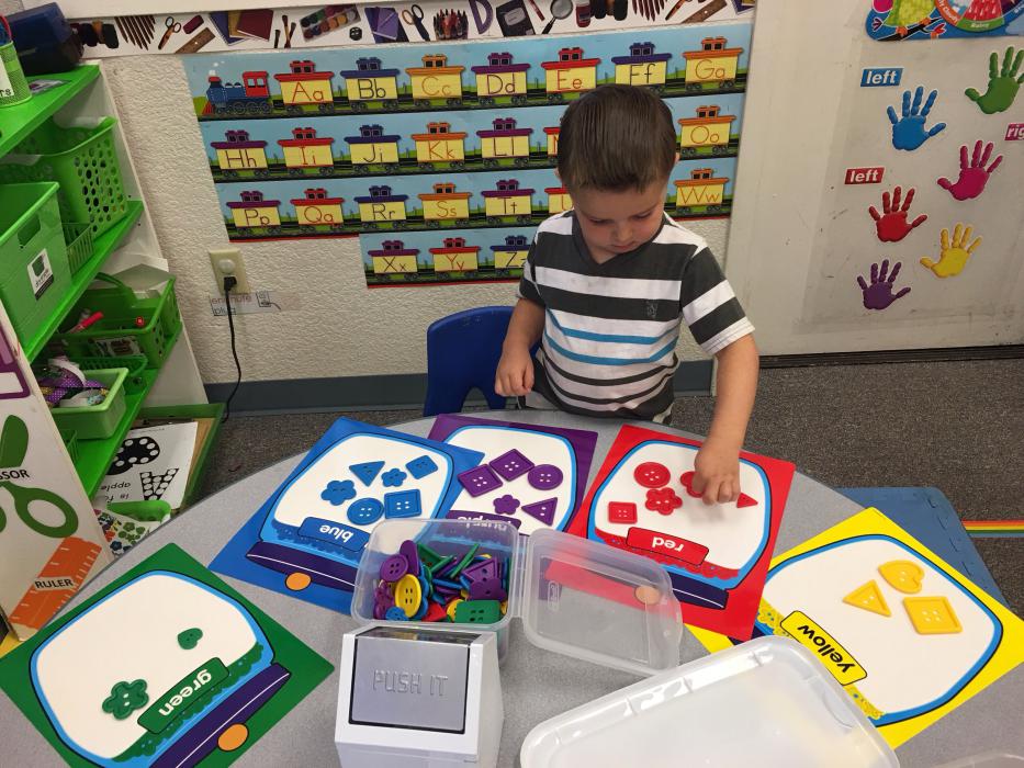Craighton McNinch works in his classroom.