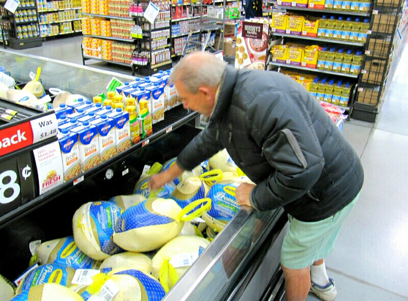 Turkeys are selected at Wal-Mart for delivery to the Douglas Senior Center in Gardnerville.