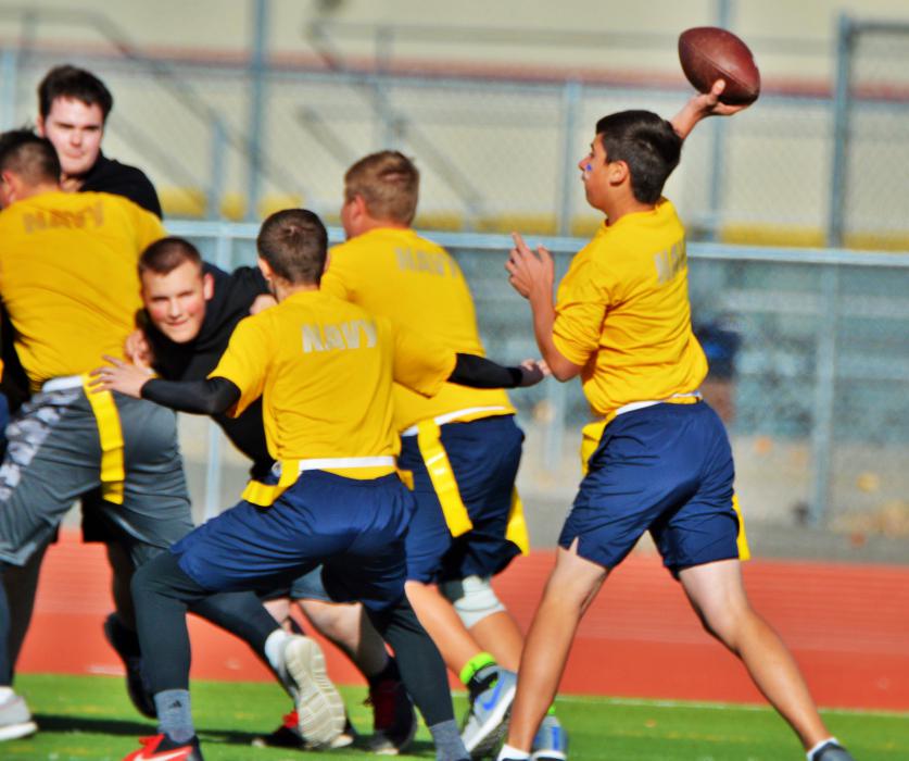 Carson Navy quarterback passes toward the end zone Saturday against Douglas.