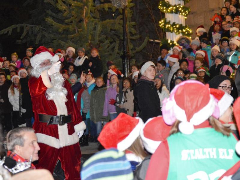 Photos by Brett Fisher. Santa Claus at the Capitol steps prior to the tree lighting.