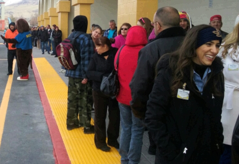 FoodMaxx customers wait outside the new Carson City location.