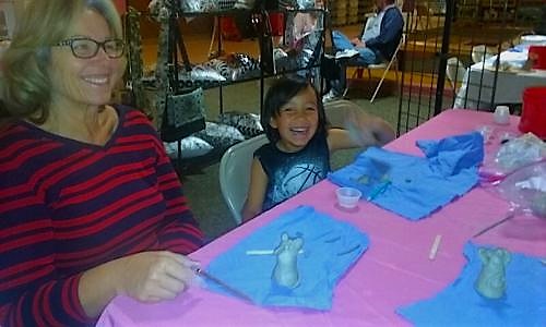 Photos by Brett Fisher. A workshop in the Carson Mall hosted by Ogres-Holm Pottery.