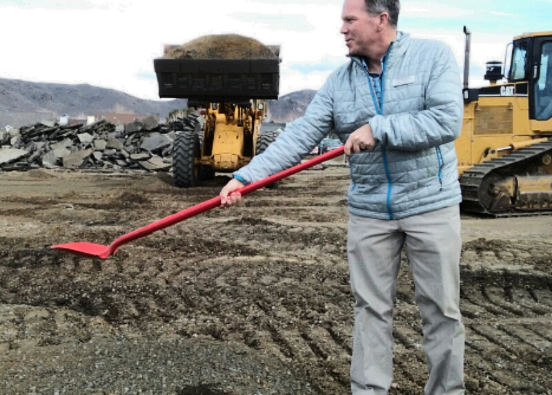 Photos by Brett Fisher. Jim Cryer breaks ground Friday on his dealership's new service center.