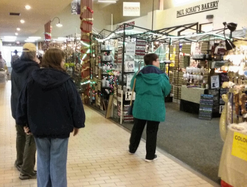 Shoppers peruse dozens of crafter booths inside the Carson Mall.
