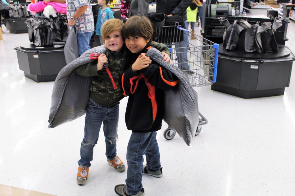 Jaden and Nicholas, Boys & Girls Club members from Carson Valley, finished their shopping and were headed out to visit Santa.