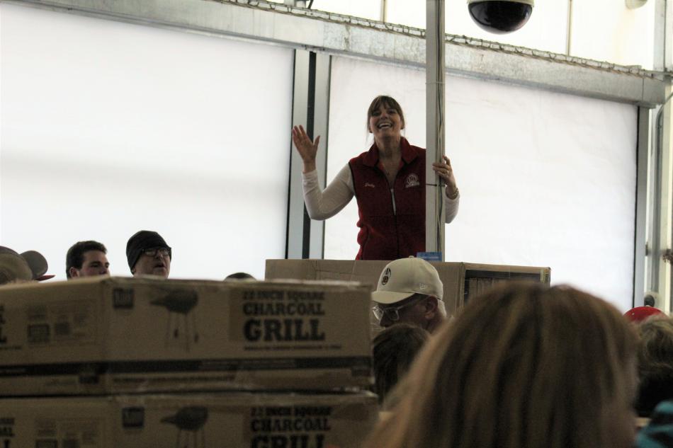 Jody Hedgcorth, Kids Christmas Coordinator for Western Nevada Supply, greets volunteers at Walmart on Topsy Lane.