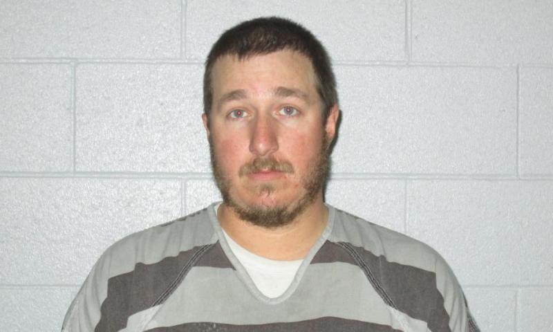 Dustin Cooper is being held without bail at the Lyon County Detention Center in Yerington.
