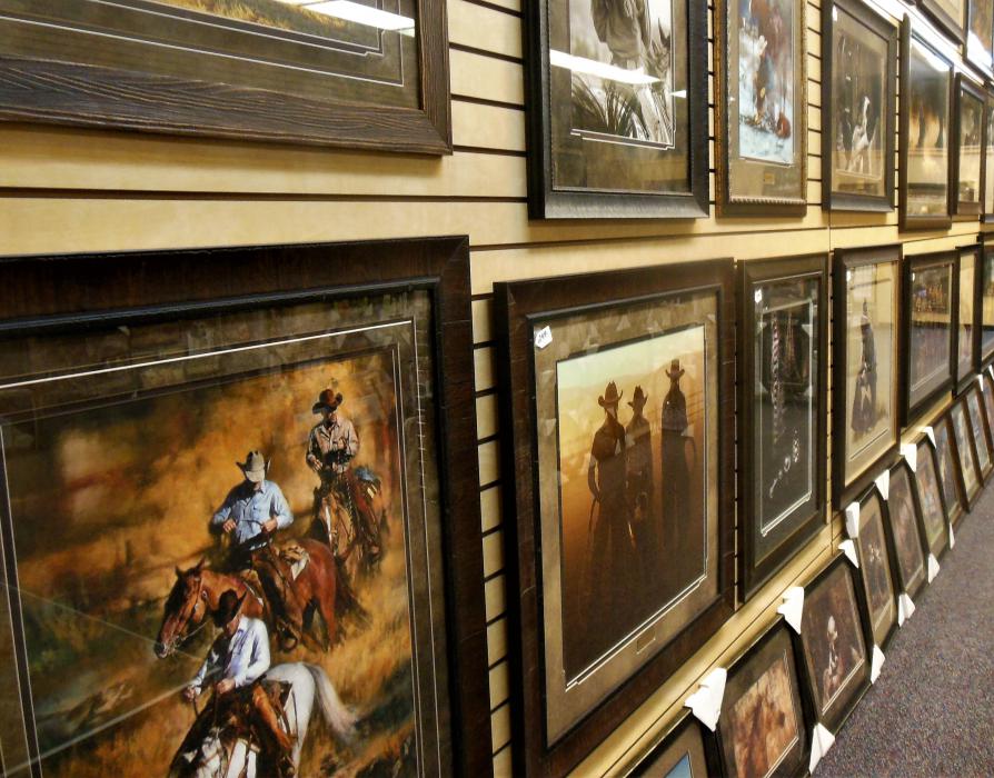 Wall to wall western-themed prints.