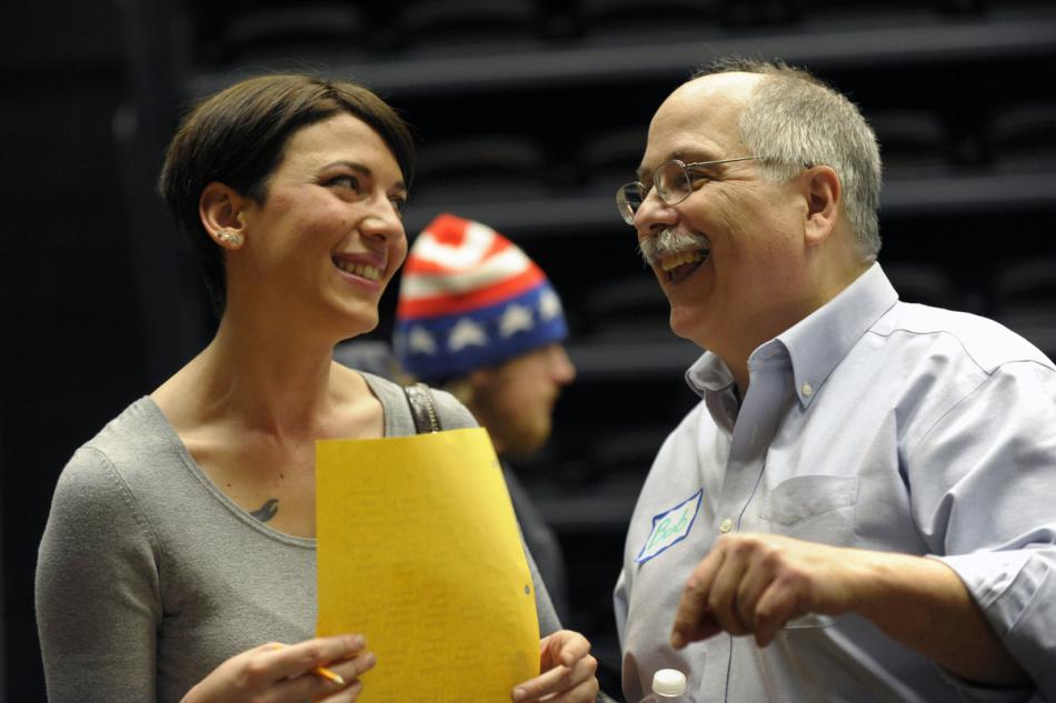 Kasey Armstrong, left, and WNC Business Professor Robert Whitcomb talk at a Business Association networking social.