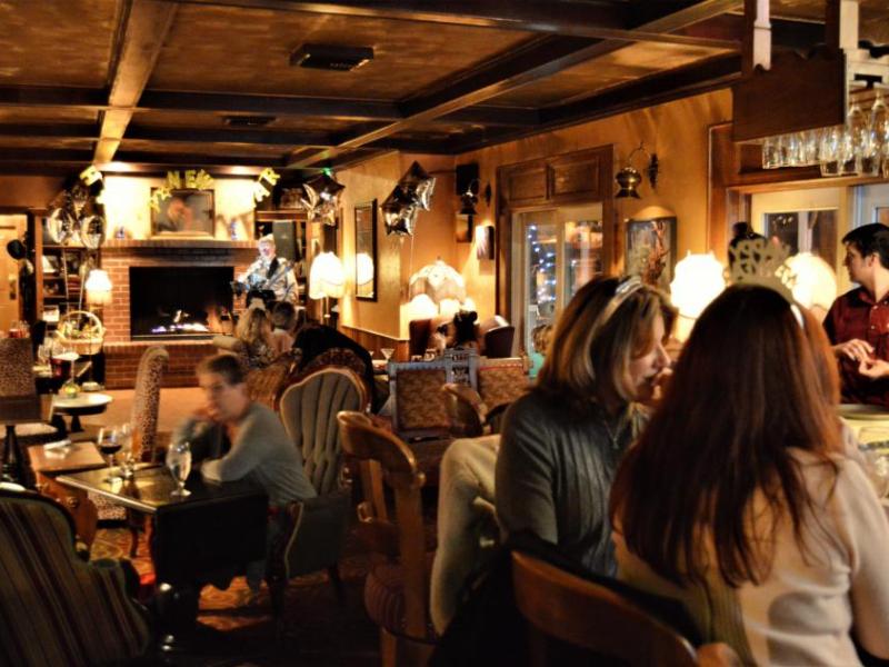 Photos by Brett Fisher. Bar and lounge inside Cafe at Adele's.