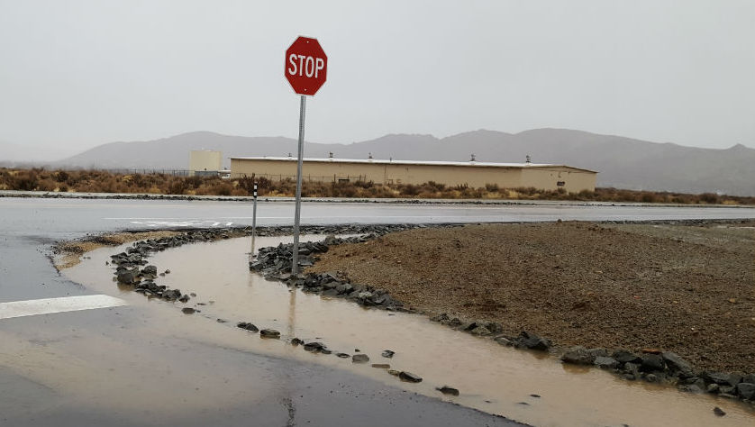 Street drainage ditches are overtaken by excessive rainwater Wednesday at Topsy and Lyla lanes. Photo by Wendy Hanson