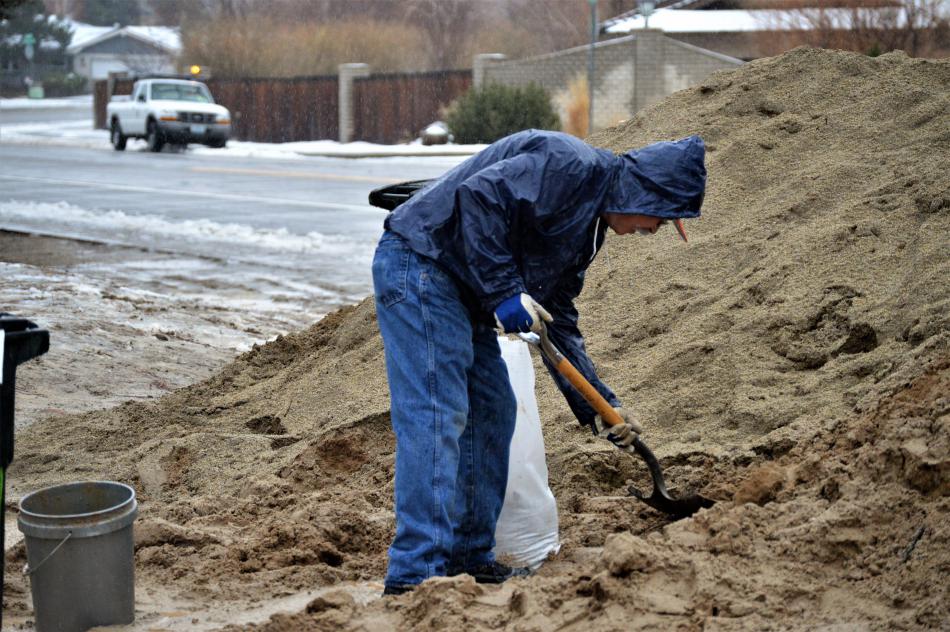 Sand bag station at Ormsby and Washington.